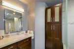 The downstairs renovated bathroom features handpicked modern touches. 